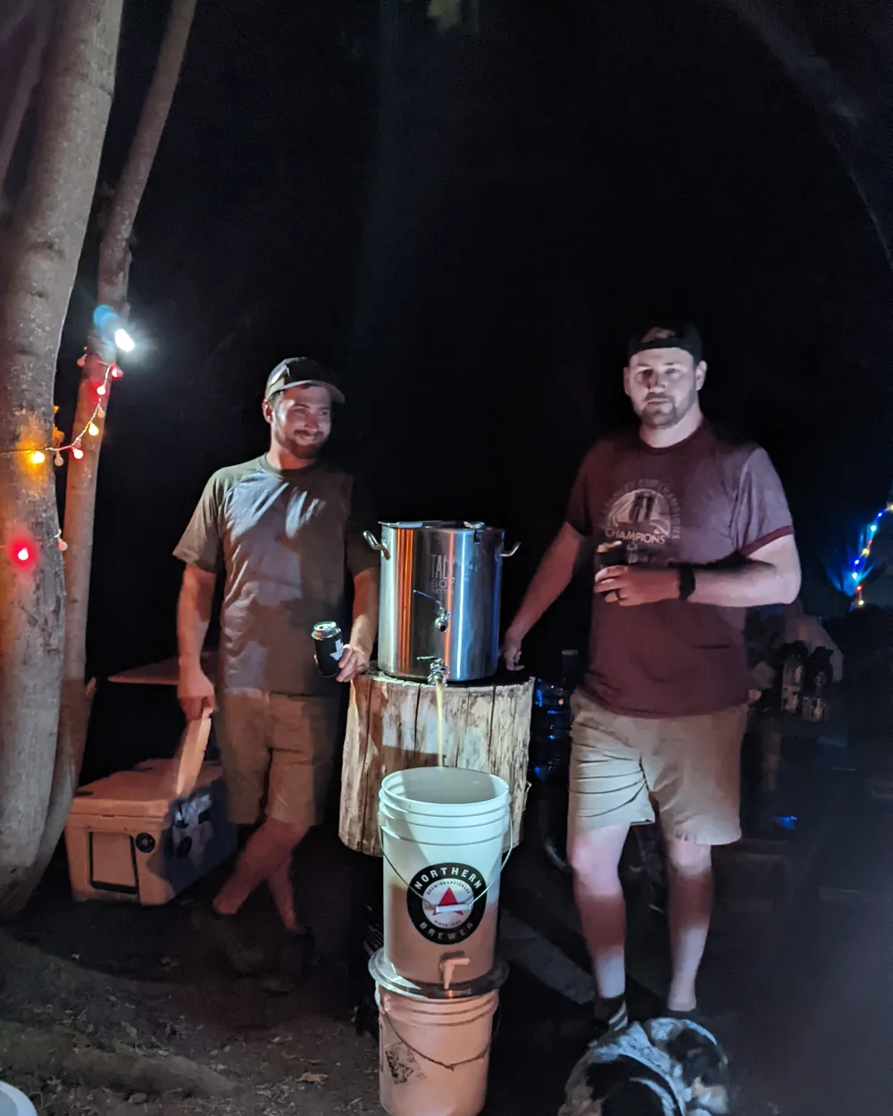 Transferring wort into a fermenter by campfire on a camping trip